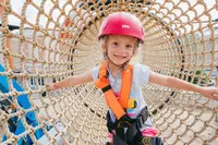 happy girl at Lumberjack Adventure Park